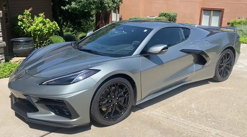Gray C8 Corvette in a Kansas City driveway, detailed by Aqulux