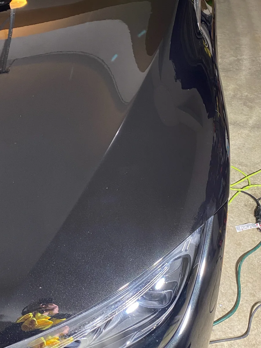 After: polished + ceramic coated, same hood